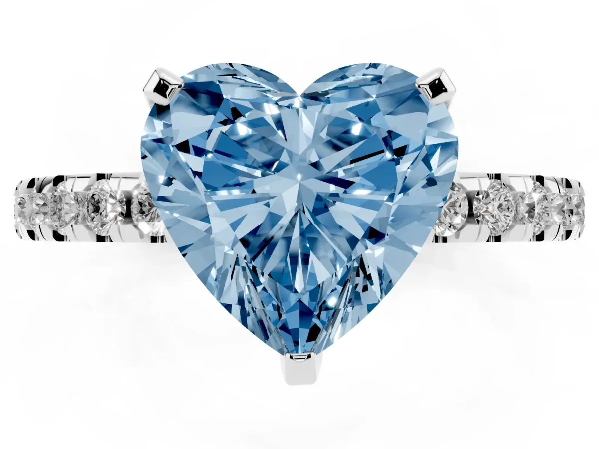 Fancy Blue Heart Cut Diamond Solitaire Ring with Round Pavé Band and Four-Prong Setting Silver