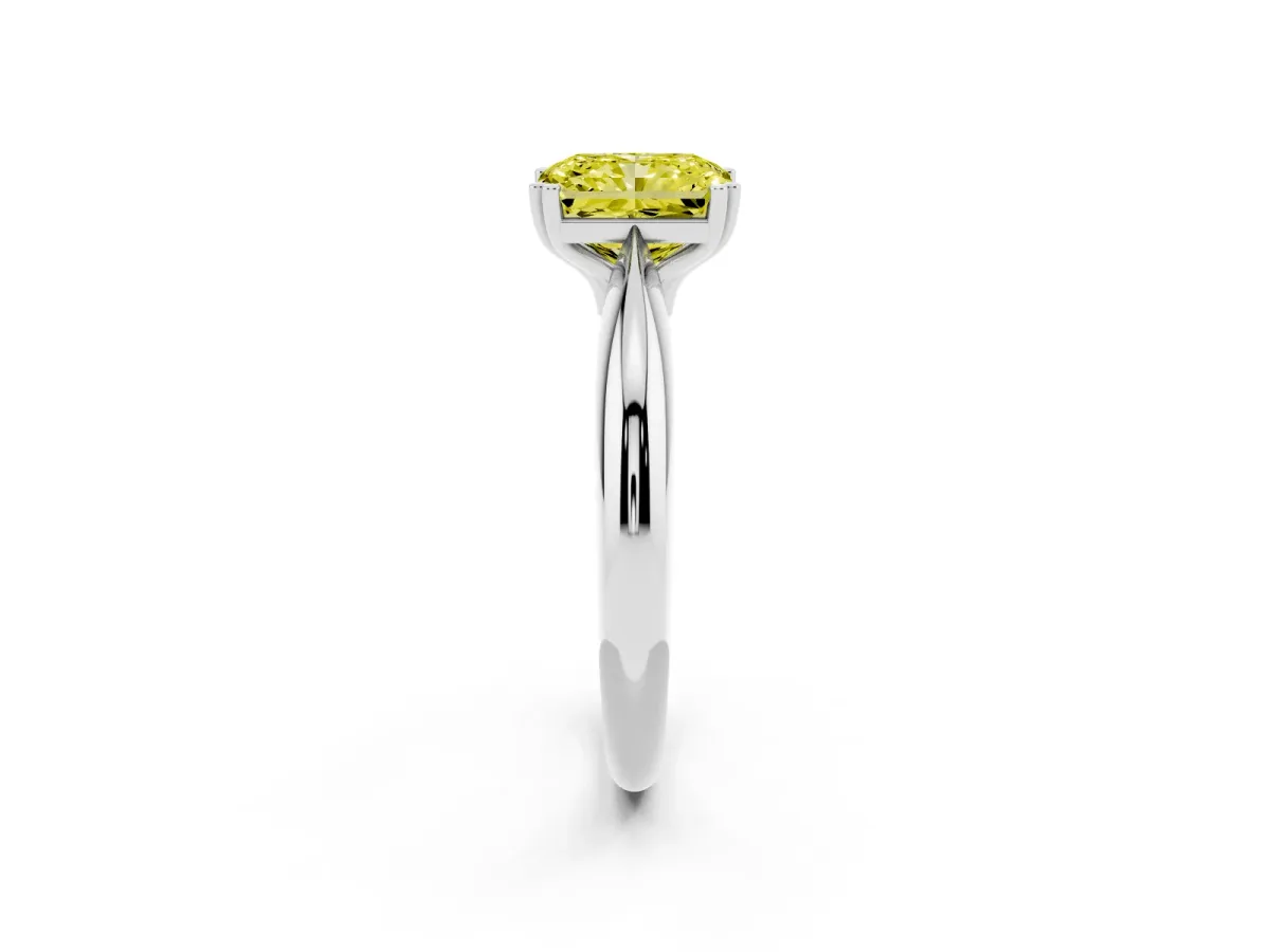 Fancy Yellow Radiant Cut Cut Solitaire Engagement Ring with Tapered Band and Four-Prong Setting White gold