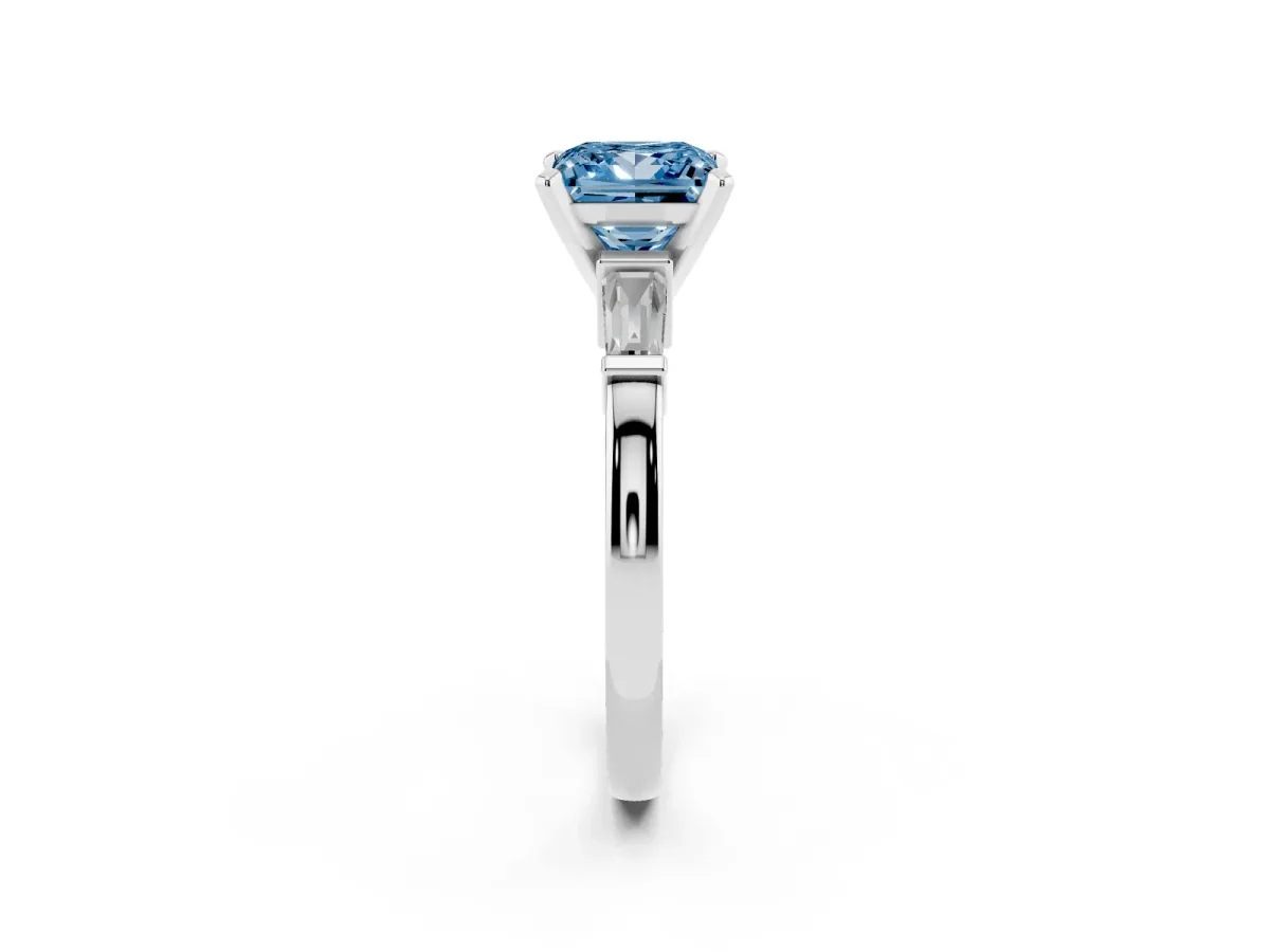 Fancy Blue Princess Cut Cut Diamond Solitaire Ring with Tapered Baguette Accents and Four-Prong Setting Platinum