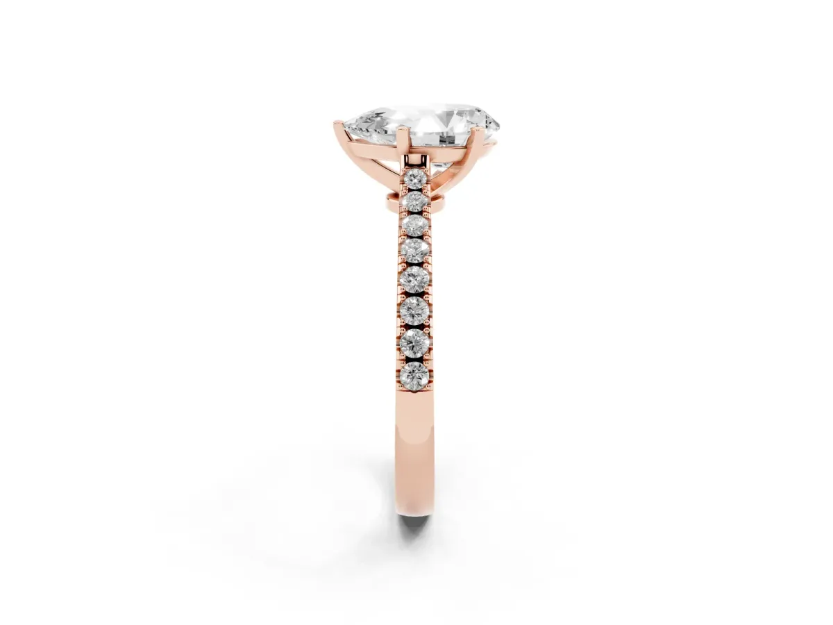 Pear Cut Cut Solitaire Diamond Engagement Ring with Pave Band and Four-Prong Setting Rose gold