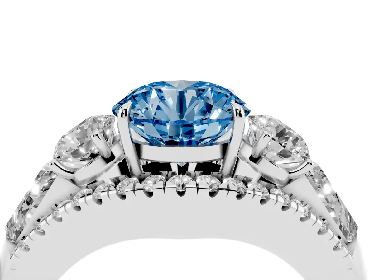 Fancy Blue Three-Stone Round Cut Diamond Engagement Ring with Pave Band and Prong Setting Silver