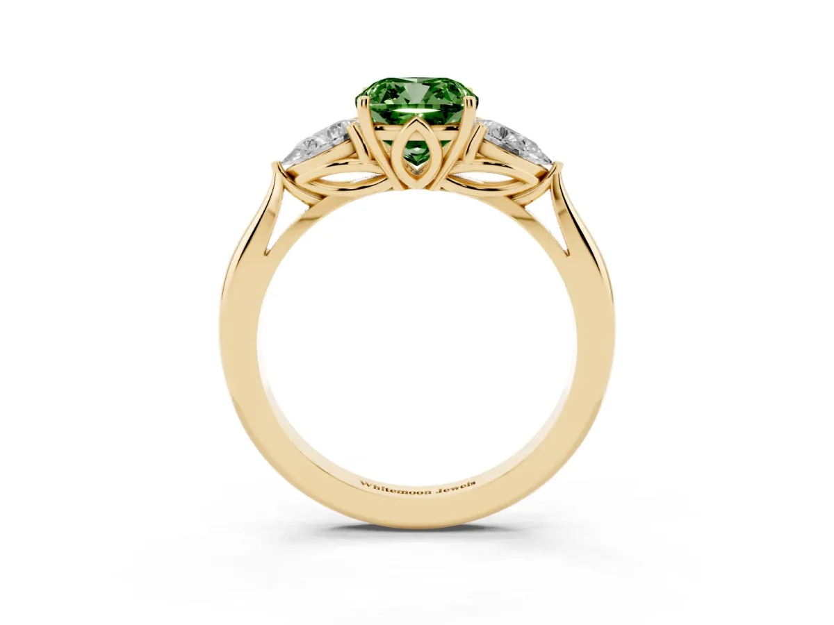 Fancy Green Three-Stone Cushion Cut Diamond Ring with Pear Side Stones in Four-Prong Setting Yellow gold