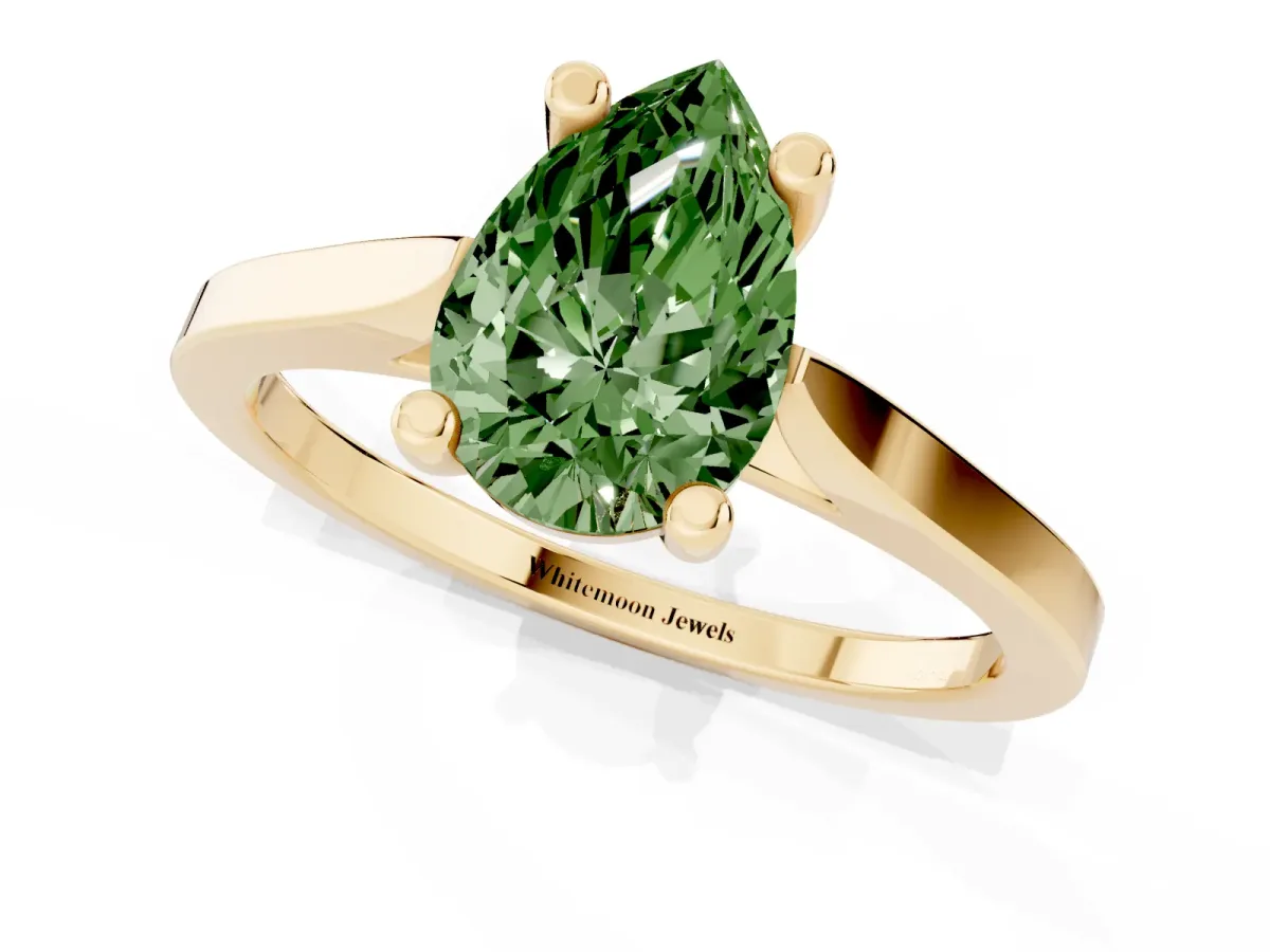 Fancy Green Pear Cut Solitaire Diamond Ring with Four-Prong Setting and Tapered Band Yellow gold