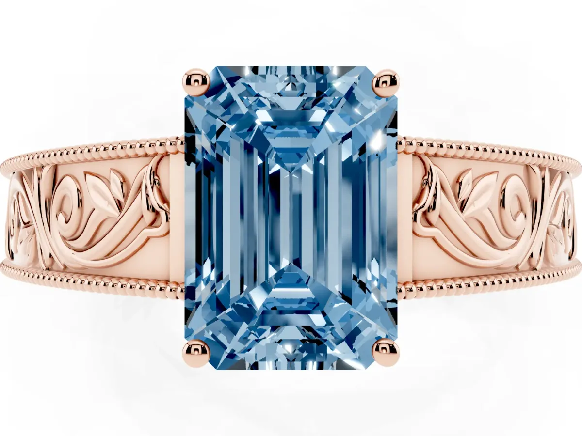 Fancy Blue Emerald Cut Diamond Solitaire Ring with Engraved Band and Four-Prong Setting Rose gold