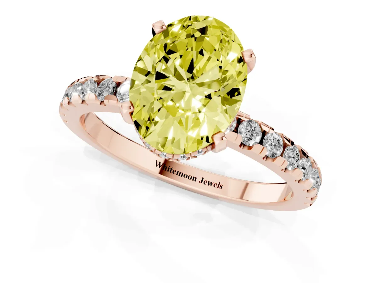 Fancy Yellow Oval Cut Diamond Solitaire Ring with Round Pavé Band and Four-Prong Setting Rose gold