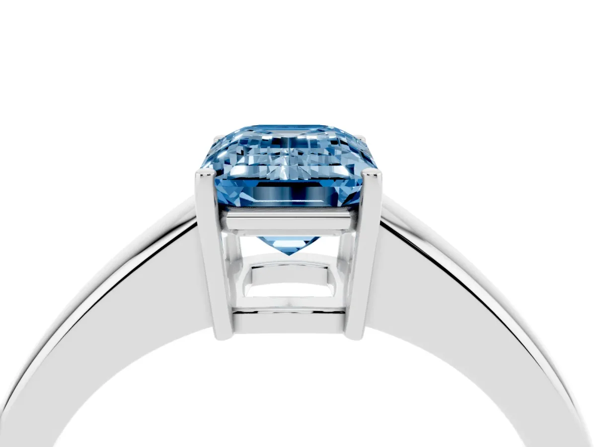 Fancy Blue Emerald Cut Solitaire Diamond Ring with Tapered Band and Four-Prong Setting Platinum
