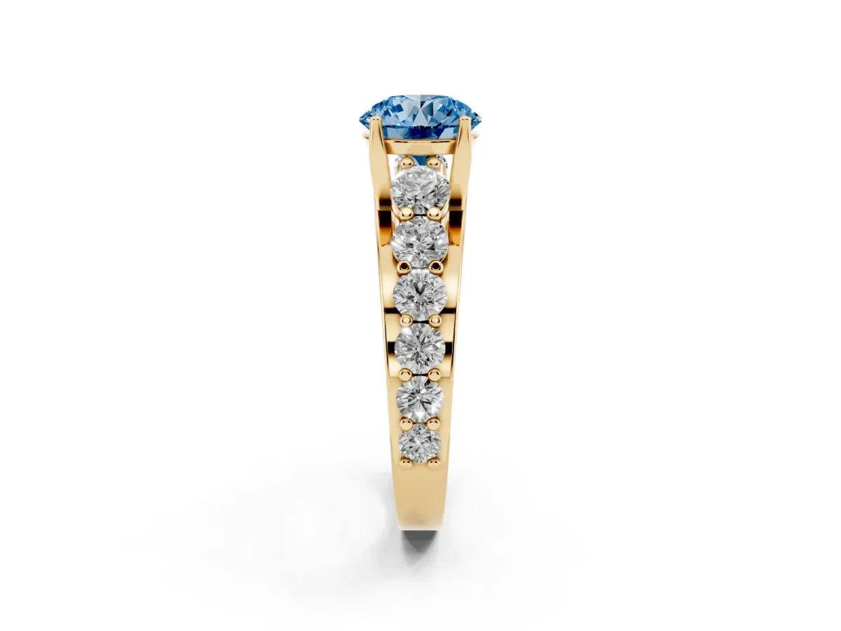 Fancy Blue Round Cut Diamond Engagement Ring with Pavé Band and Four-Prong Setting Yellow gold