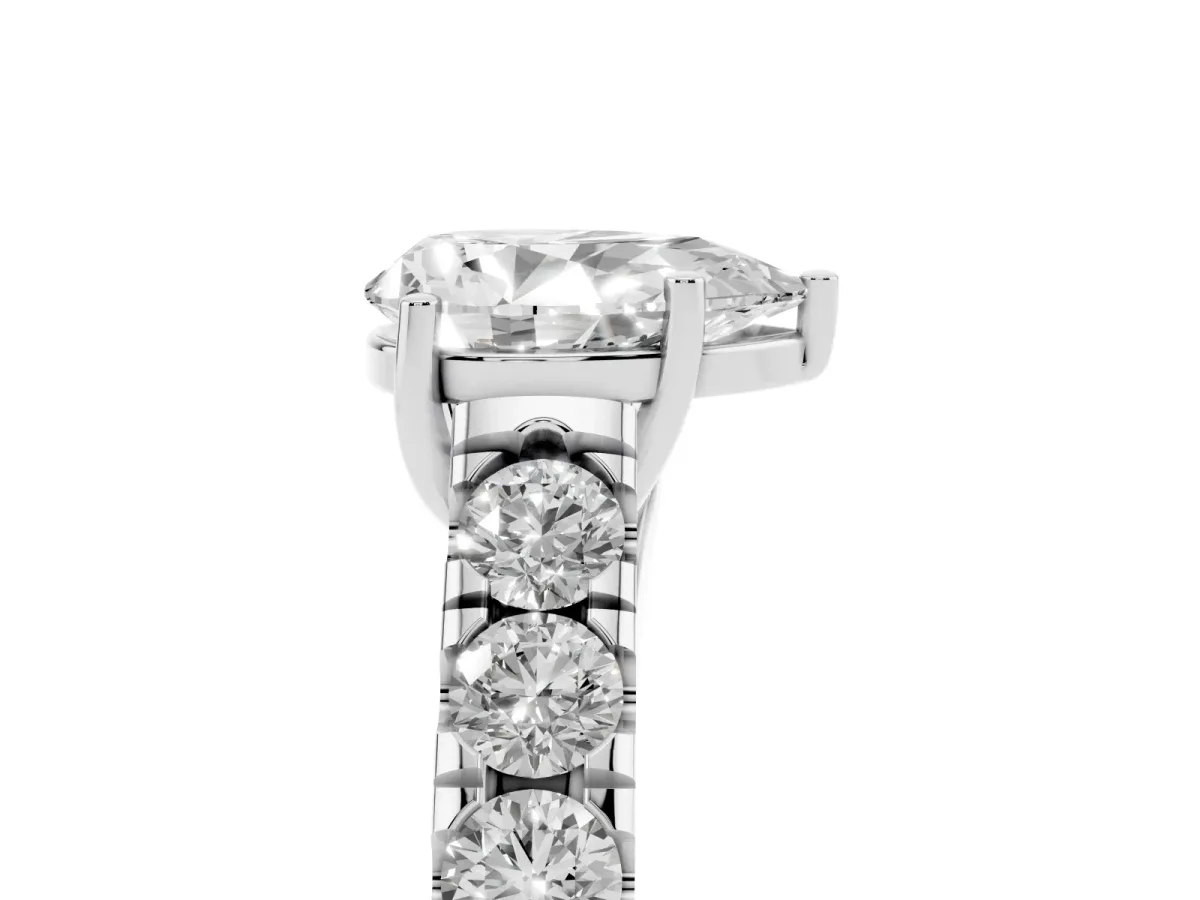 Pear Cut Cut Diamond Solitaire Ring with Micro Pave Band and Prong Setting Platinum