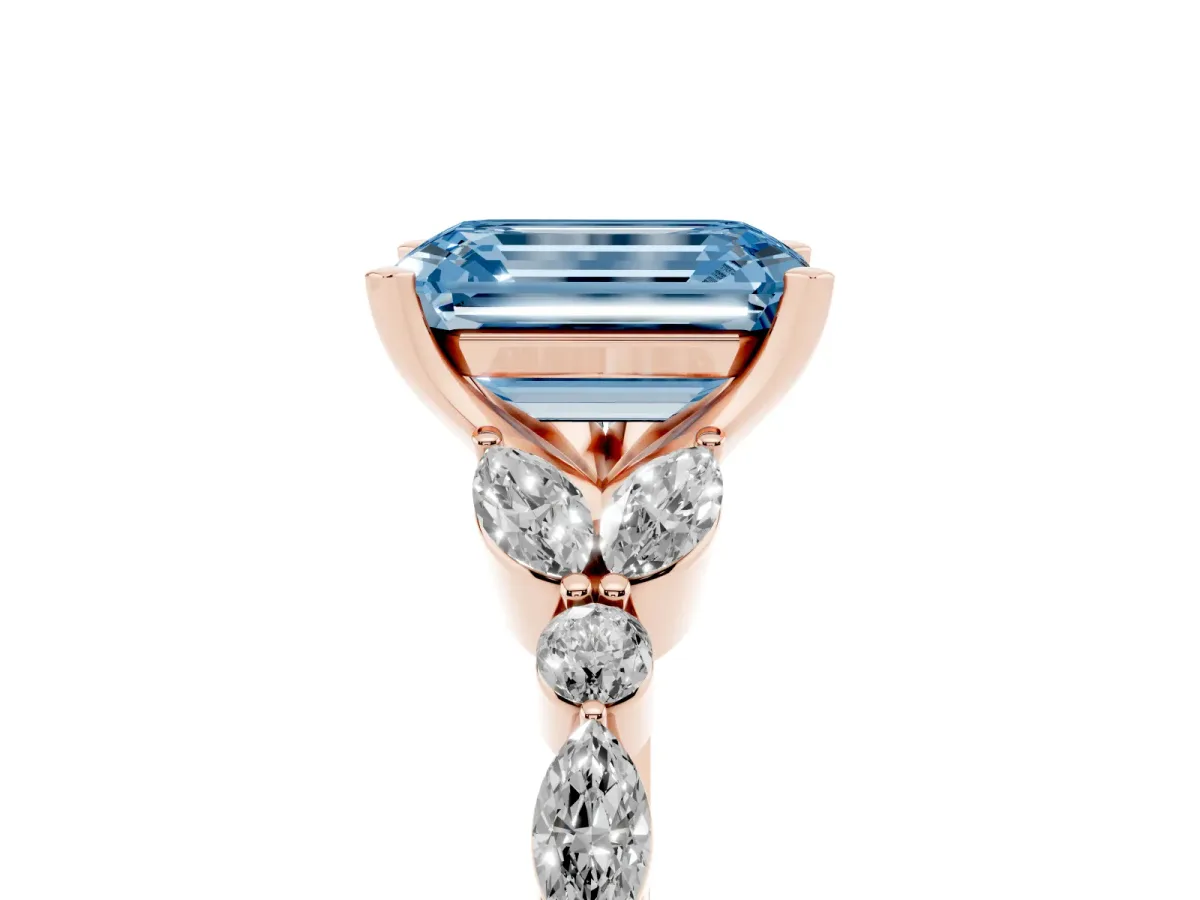 Fancy Blue Emerald Cut Diamond Solitaire Ring with Side Stones and Four-Prong Setting Rose gold