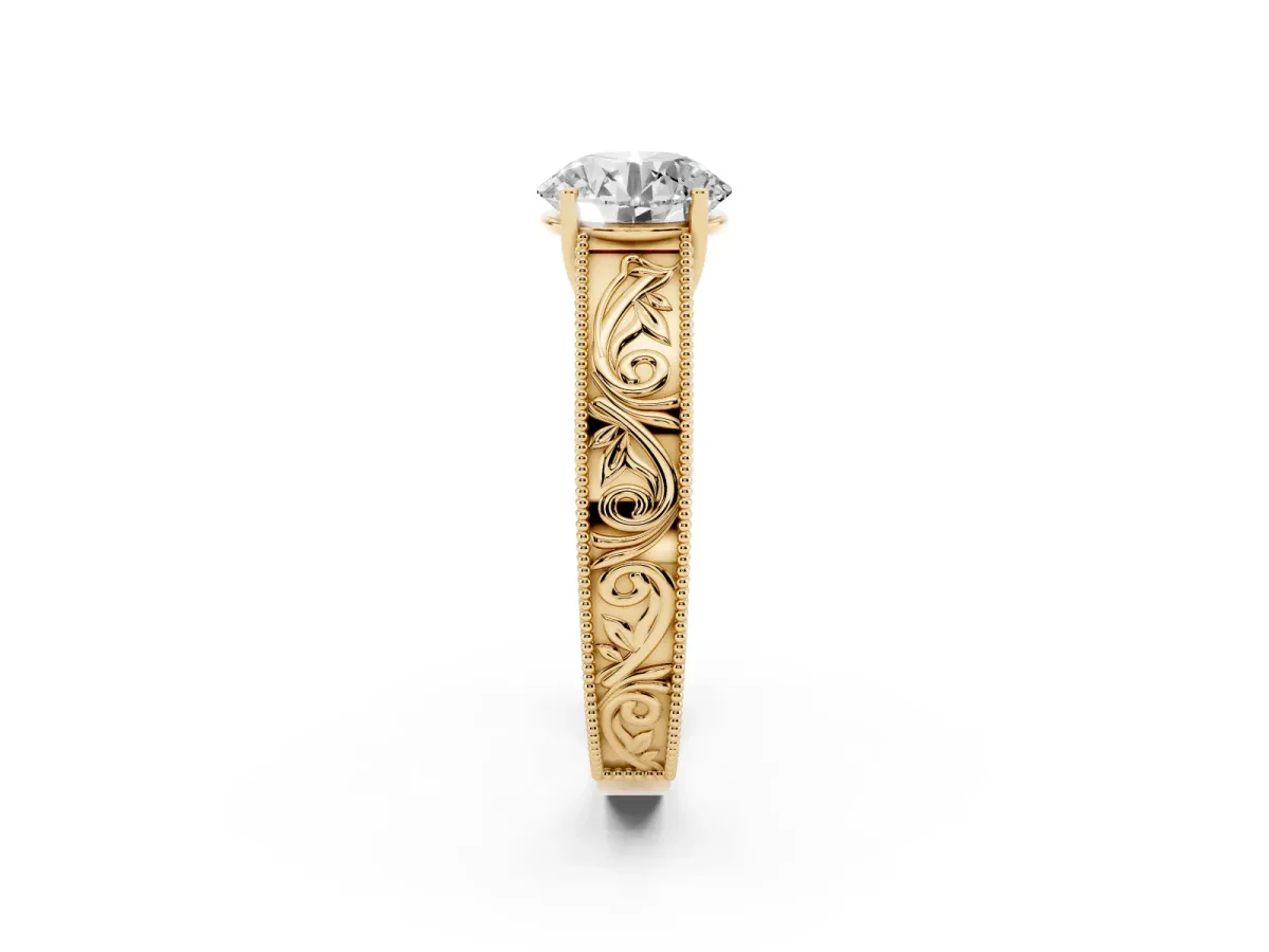 Round Cut Diamond Solitaire Ring with Engraved Band and Four-Prong Setting Yellow gold