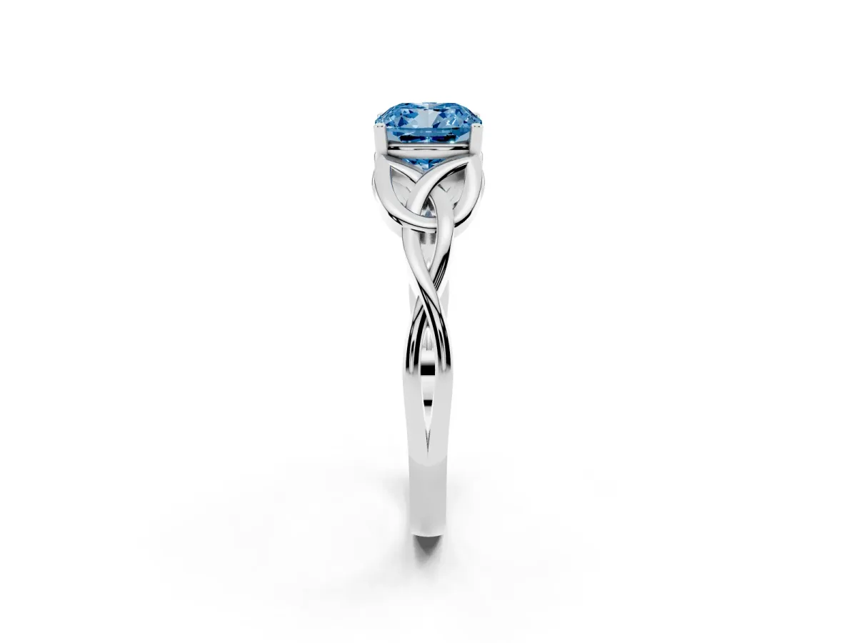 Fancy Blue Cushion Cut Diamond Solitaire Engagement Ring with Celtic Knot Band and Four-Prong Setting Silver