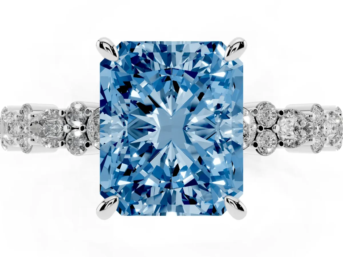 Fancy Blue Radiant Cut Diamond Side Stone Solitaire Ring with Round and Four-Prong Setting Platinum