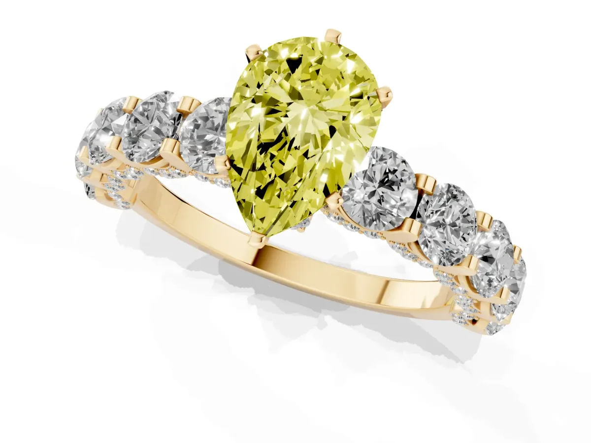 Fancy Yellow Pear Cut Diamond Side Stone Engagement Ring with Four-Prong Setting Yellow gold
