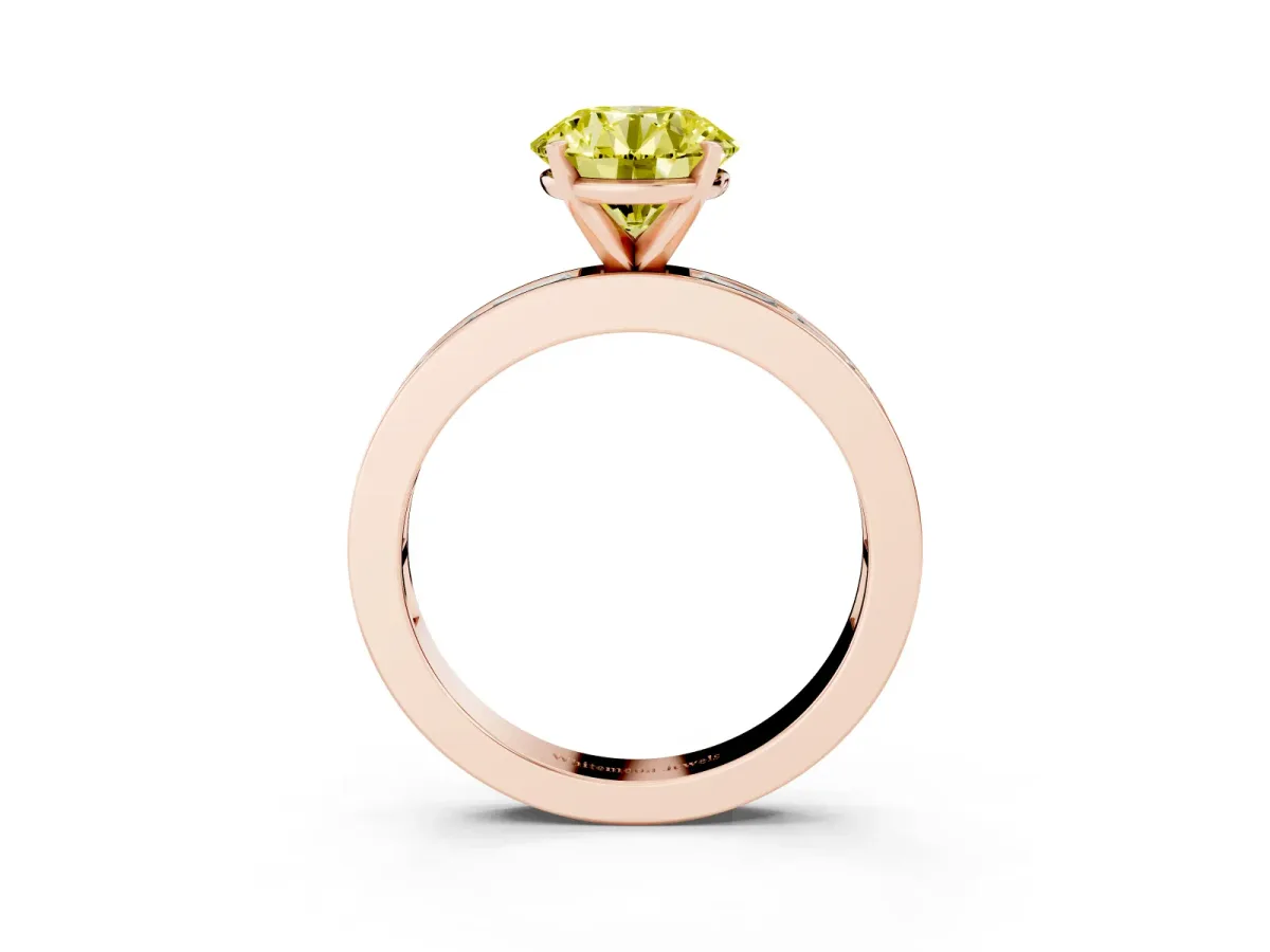 Fancy Yellow Round Cut Solitaire Diamond Ring with Channel-Set Baguette Band and Four-Prong Setting Rose gold