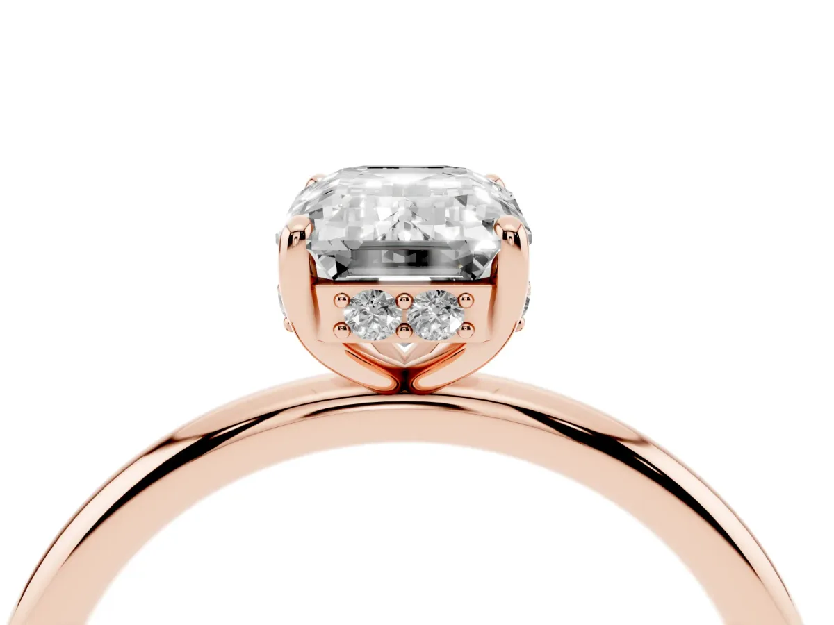 Emerald Cut Solitaire Diamond Ring with a Classic Band and Four-Prong Setting Rose gold