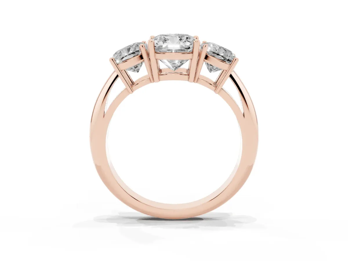 Three-Stone Cushion Cut Cut Diamond Engagement Ring with Prong Setting on a White Gold Band Rose gold