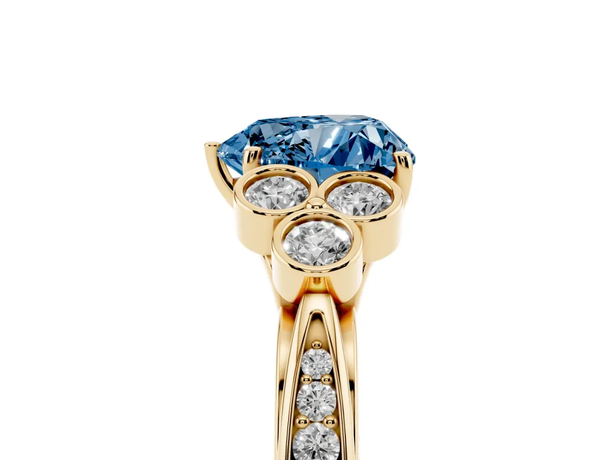 Fancy Blue Heart Cut Cut Diamond Engagement Ring with Bezel Set Round Side Stones and Prong Setting Yellow gold