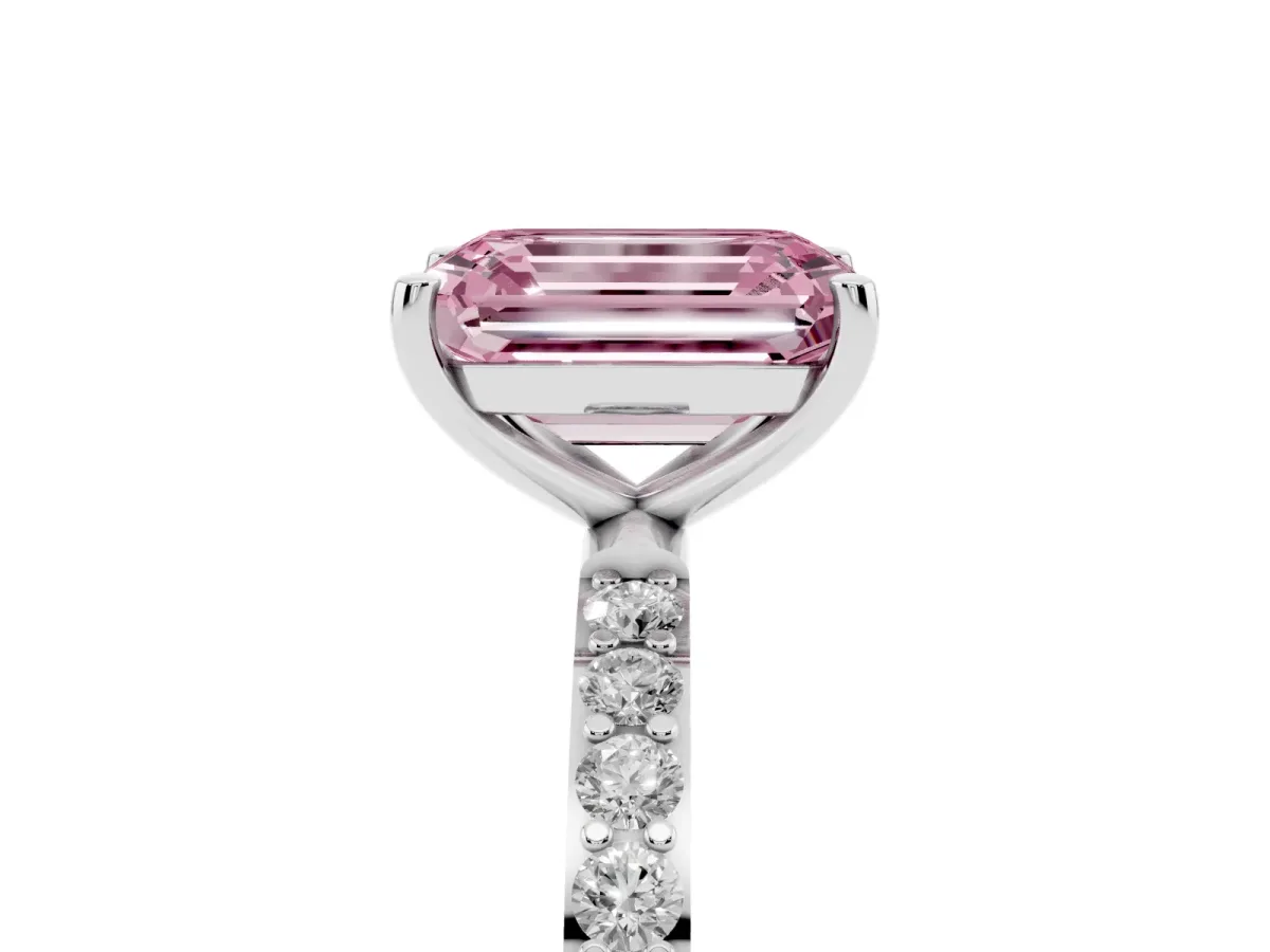Fancy Pink Emerald Cut Diamond Solitaire Ring with Round Pavé Shoulders and Prong Setting Platinum