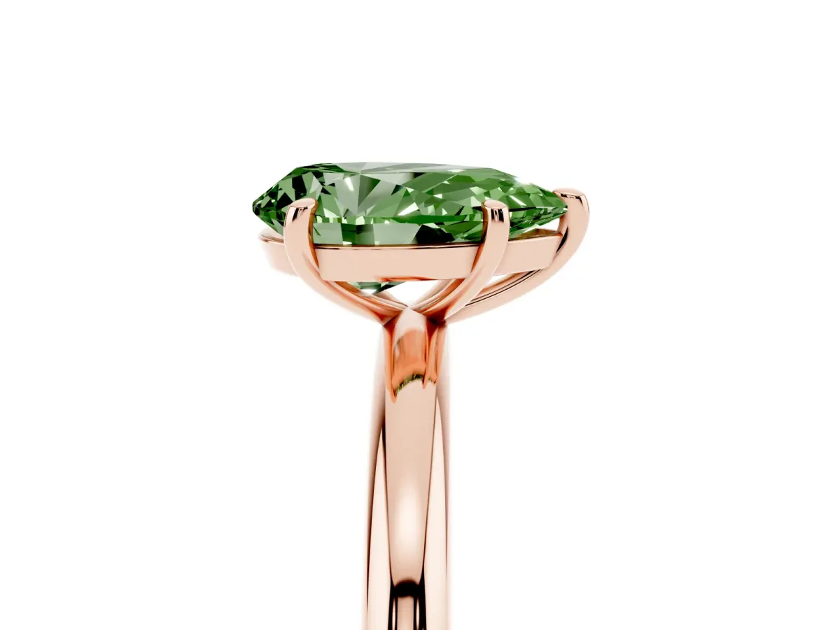 Fancy Green Pear Cut Solitaire Diamond Ring with Four-Prong Setting on a Plain Band Rose gold