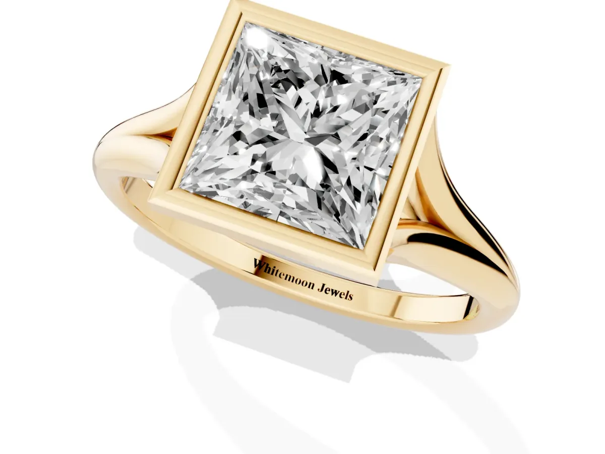 Bezel Set Princess Cut Cut Solitaire Ring with Tapered Band Yellow gold