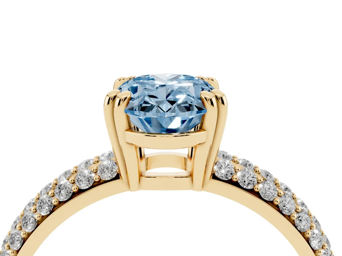 Fancy Blue Oval Cut Diamond Solitaire Ring with Multi-Row Round Pavé Band and Prong Setting Yellow gold