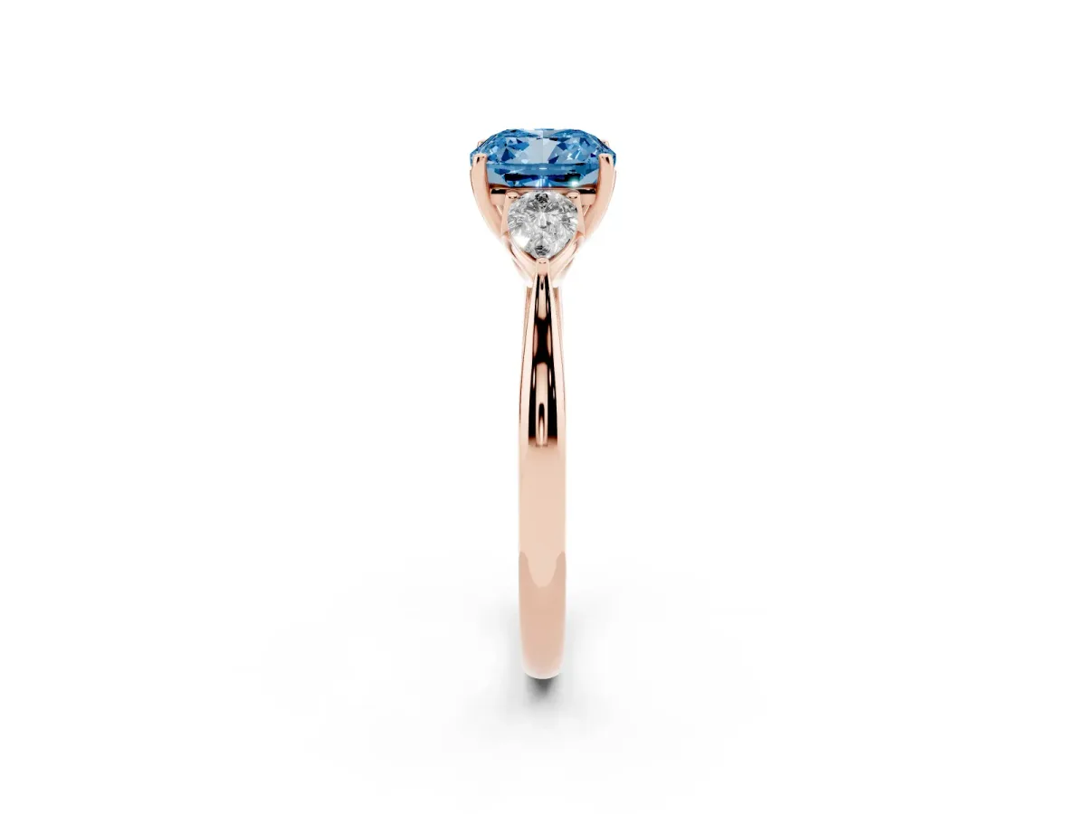 Fancy Blue Cushion Cut Diamond Three-Stone Ring with Pear Side Stones and Prong Setting Rose gold
