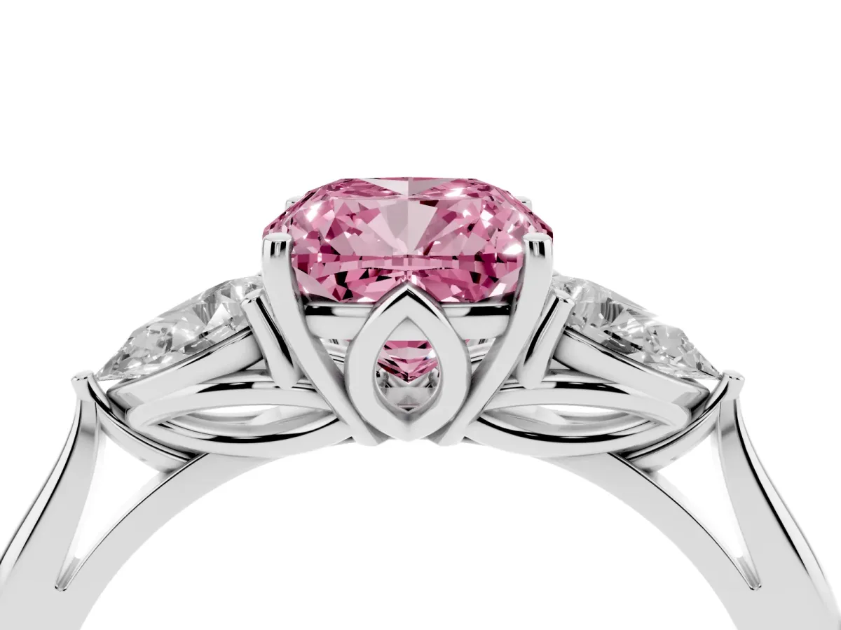 Fancy Pink Three-Stone Cushion Cut Diamond Ring with Pear Side Stones in Four-Prong Setting Platinum