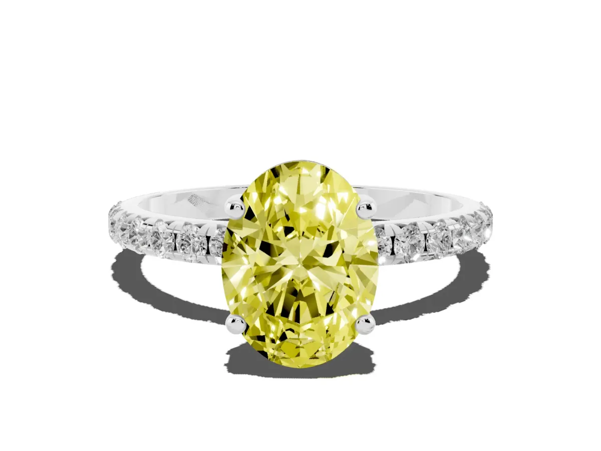 Fancy Yellow Oval Cut Cut Diamond Solitaire Ring with Micro Pave Band and Four Prong Setting Silver