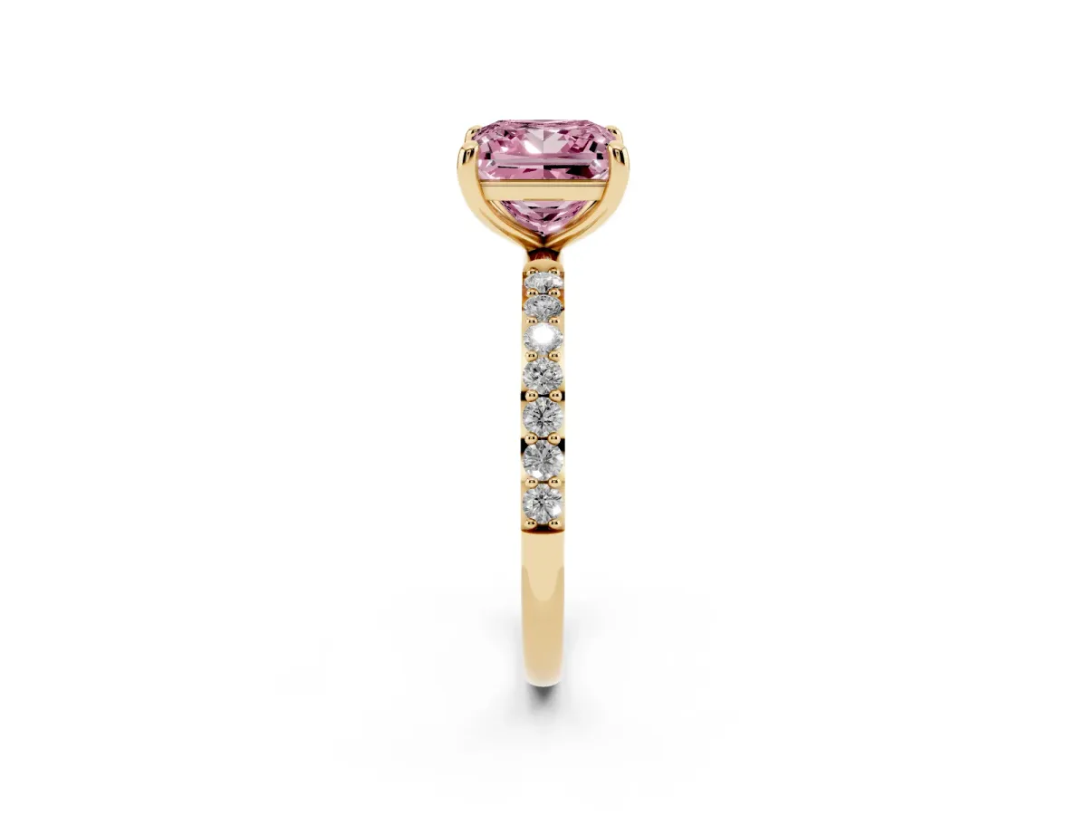 Fancy Pink Princess Cut Diamond Solitaire Ring with Round Pavé Band and Prong Setting Yellow gold