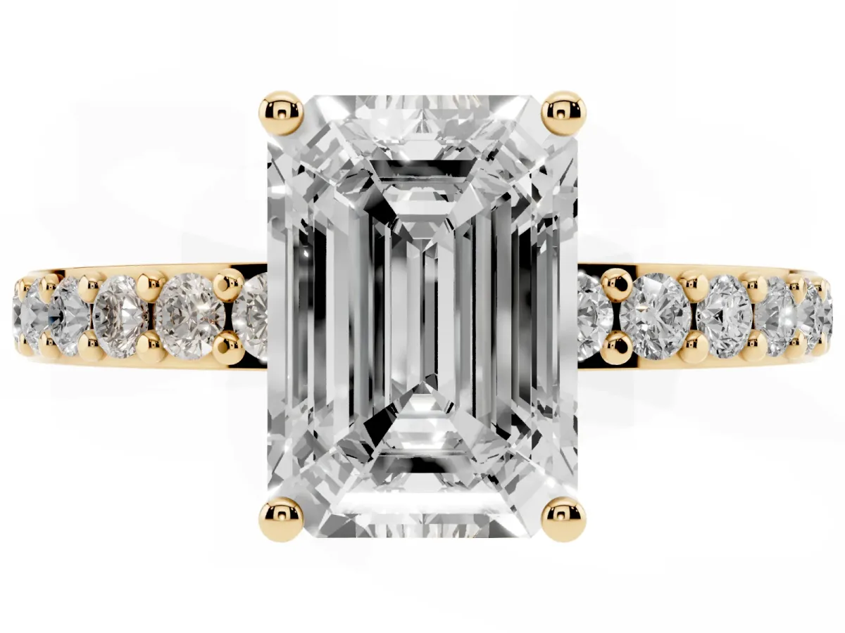 Emerald Cut Cut Diamond Solitaire with Pave Band and Four-Prong Setting Yellow gold