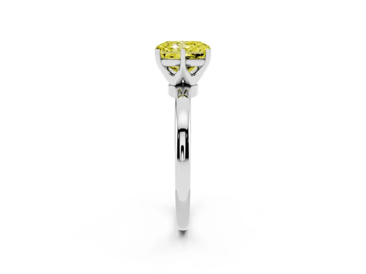 Fancy Yellow Radiant Cut Solitaire Diamond Ring with Six-Prong Setting on a Classic Band Silver