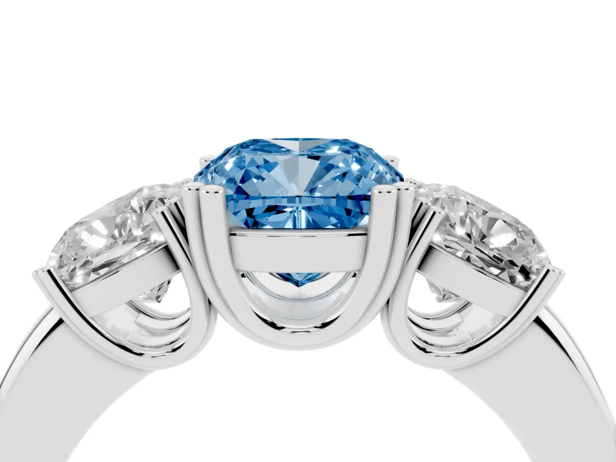 Fancy Blue Three-Stone Cushion Cut Cut Diamond Ring with Channel Set Band and Four-Prong Setting Platinum