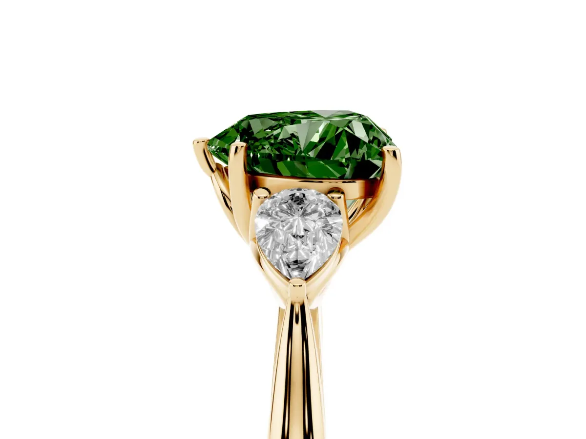 Fancy Green Heart Cut Diamond Three-Stone Ring with Pear Side Stones and Prong Setting Yellow gold