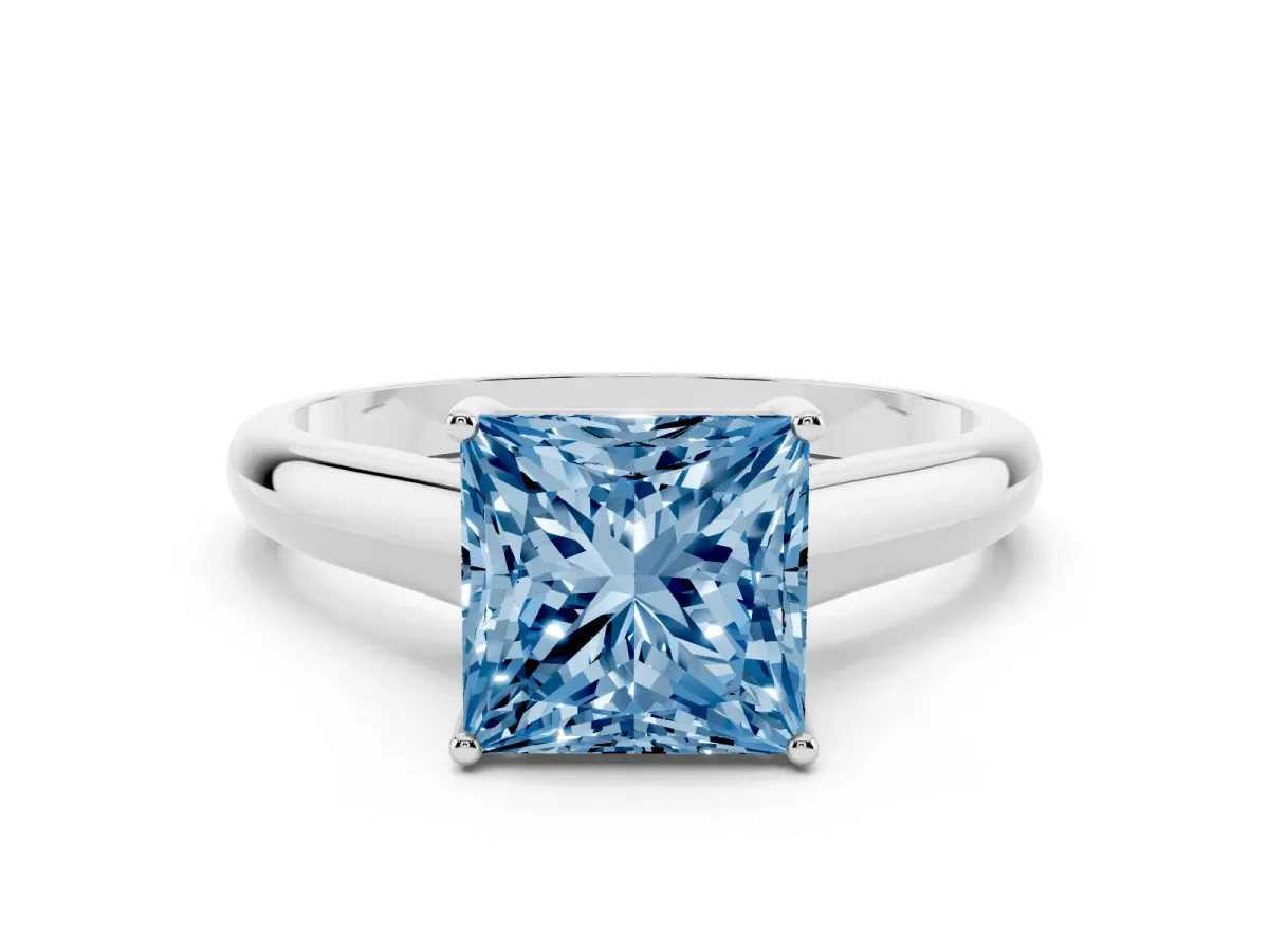 Fancy Blue Princess Cut Solitaire Engagement Ring with Tapered Band and Four-Prong Setting Silver