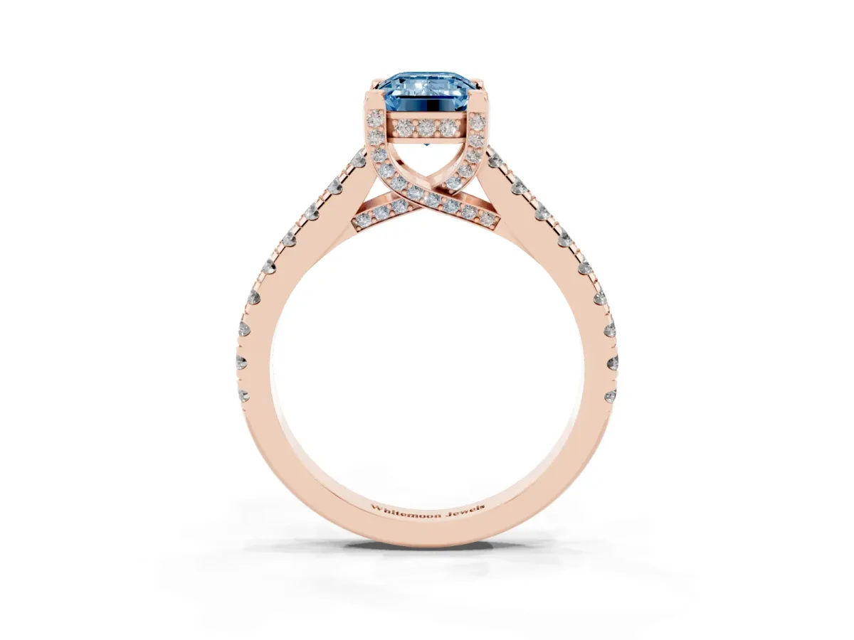 Fancy Blue Emerald Cut Brilliant Diamond Solitaire with Pavé Band and Four-Prong Setting Rose gold