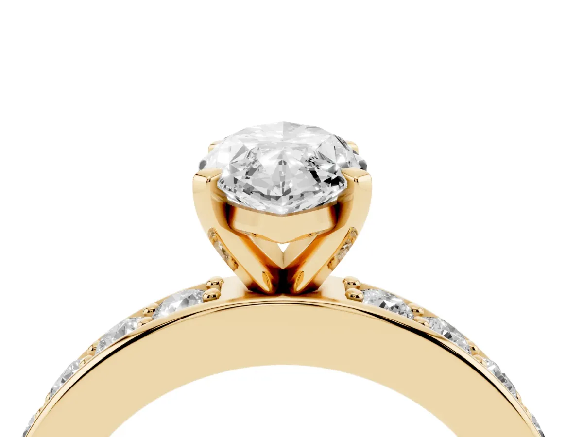 Marquise Cut Diamond Engagement Ring with Channel Set Round Band and Prong Setting Yellow gold