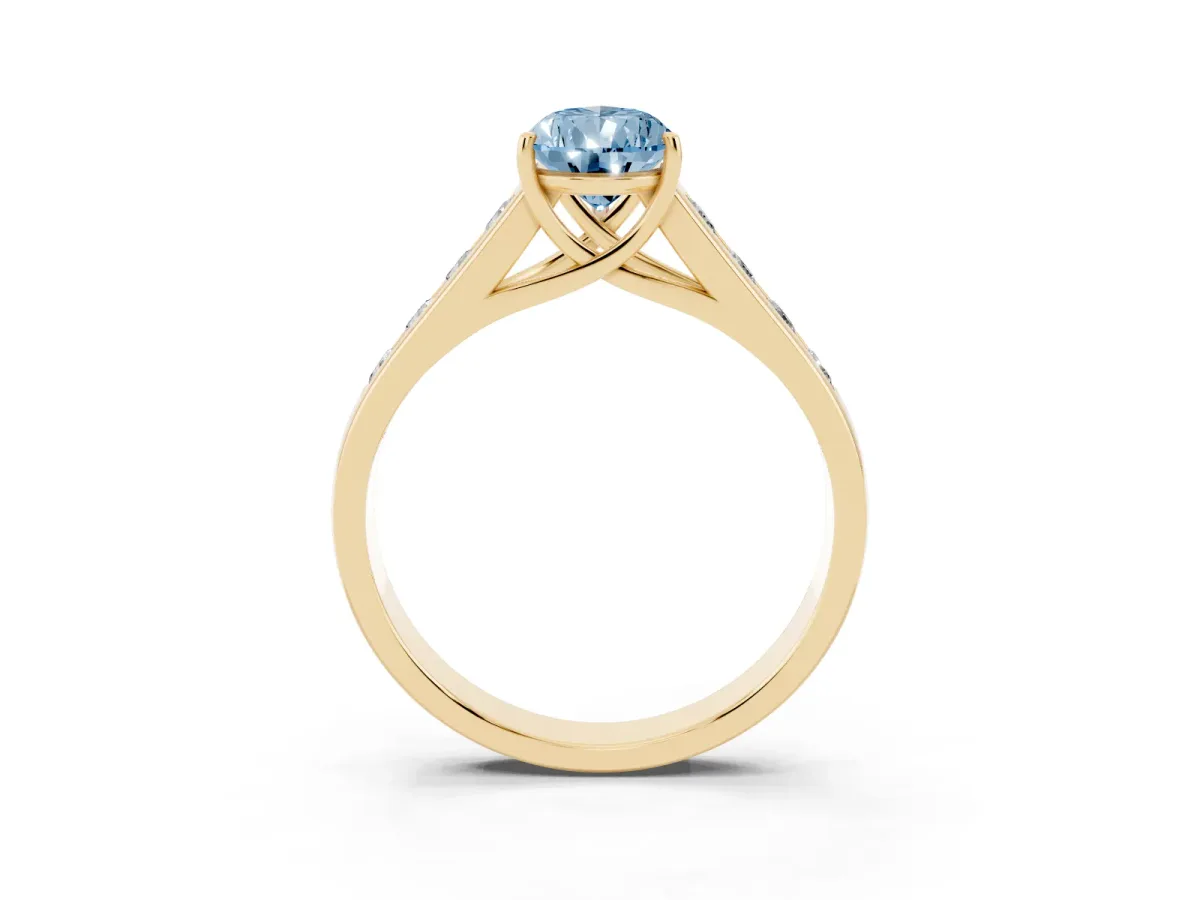 Fancy Blue Pear Cut Solitaire Channel-Set Diamond Engagement Ring with Four-Prong Setting Yellow gold