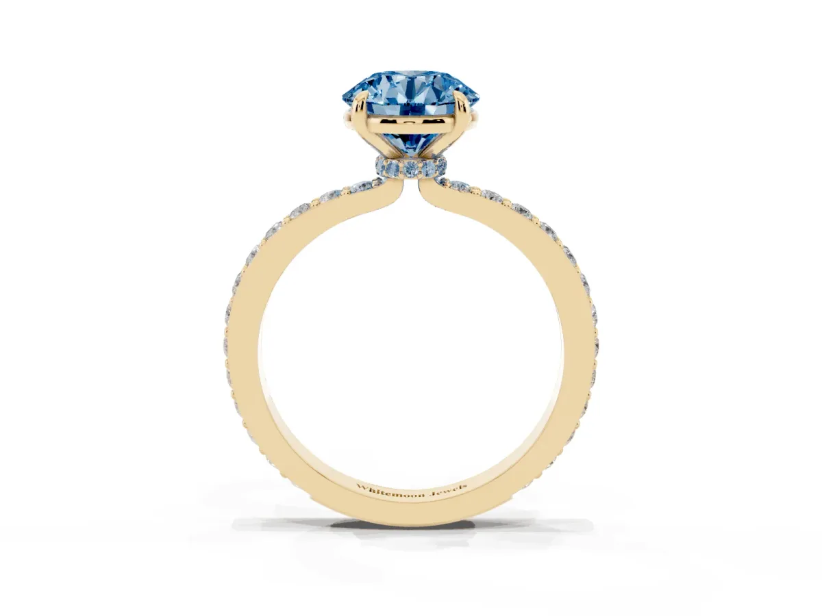 Fancy Blue Round Cut Diamond Pavé Engagement Ring with Round Accents and Prong Setting Yellow gold
