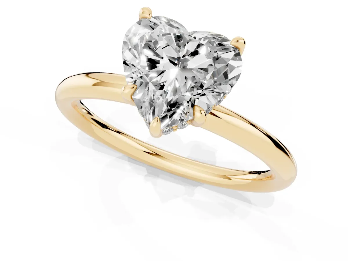 Heart Cut Diamond Solitaire Ring with Thin Band and Four-Prong Setting Yellow gold