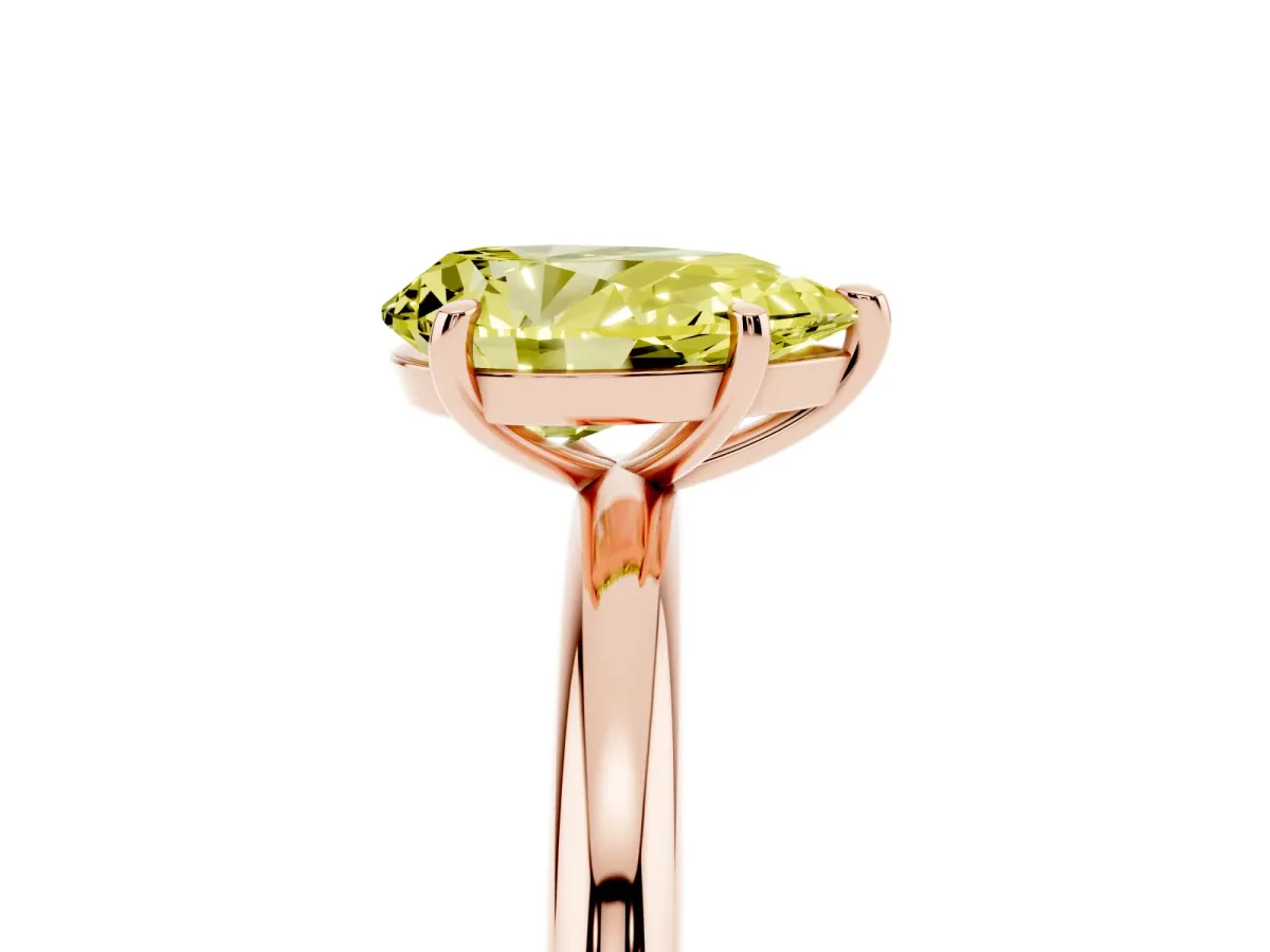 Fancy Yellow Pear Cut Solitaire Diamond Ring with Four-Prong Setting on a Plain Band Rose gold