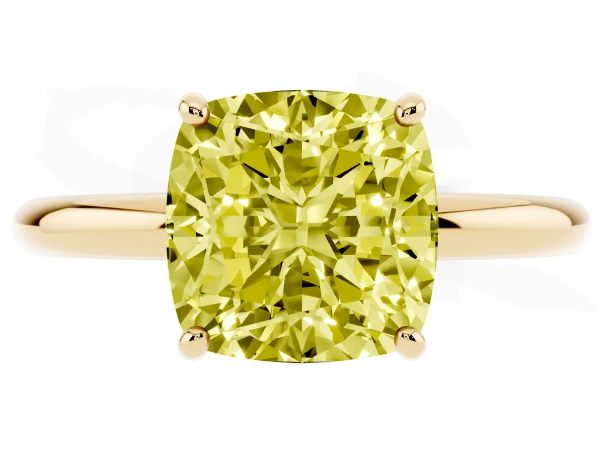 Fancy Yellow Cushion Cut Solitaire Diamond Ring with Four-Prong Setting on a Plain Band Yellow gold