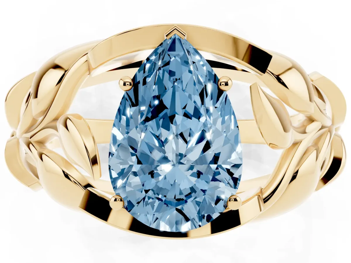 Fancy Blue Pear Cut Diamond Leaf-Inspired Engagement Ring with Round Accents and Prong Setting Yellow gold