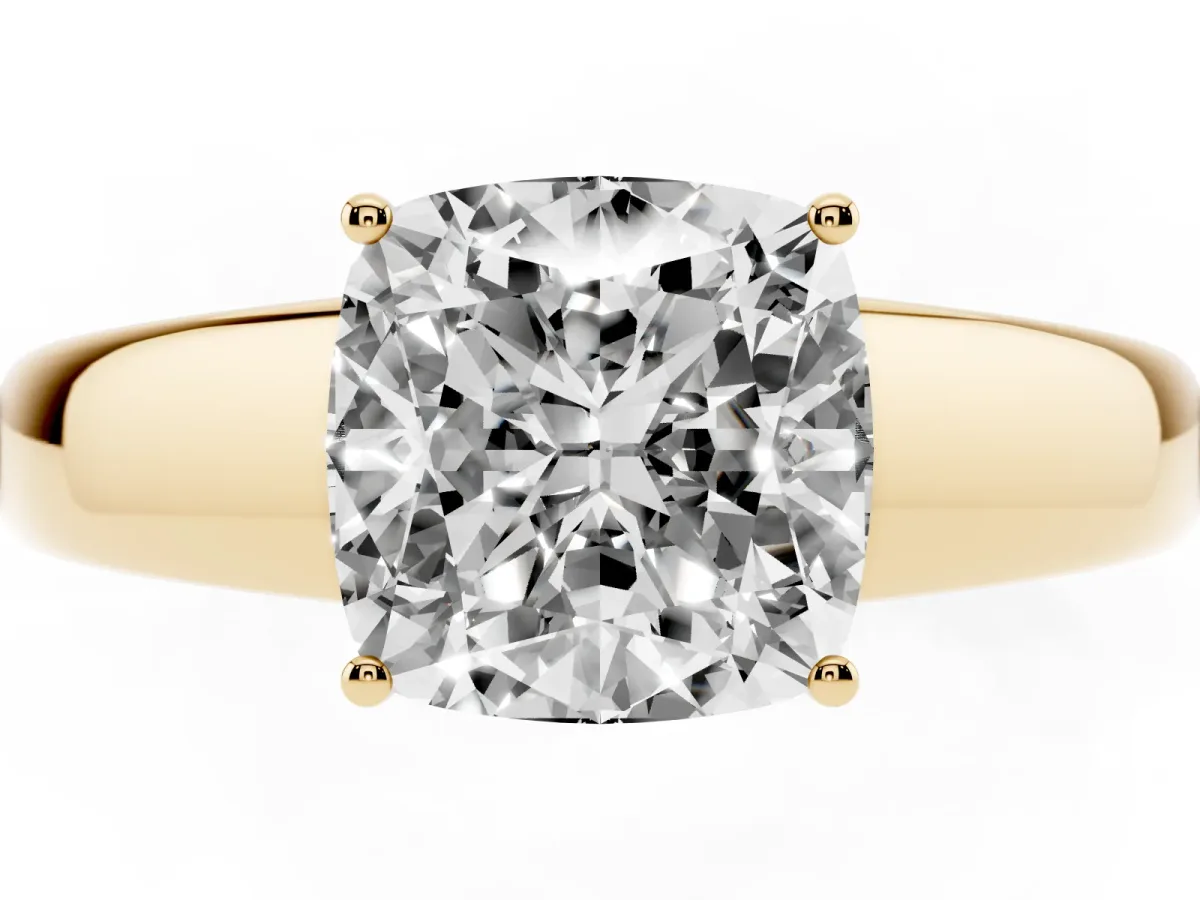 Cushion Cut Solitaire Diamond Ring with Tapered Band and Four-Prong Setting Yellow gold