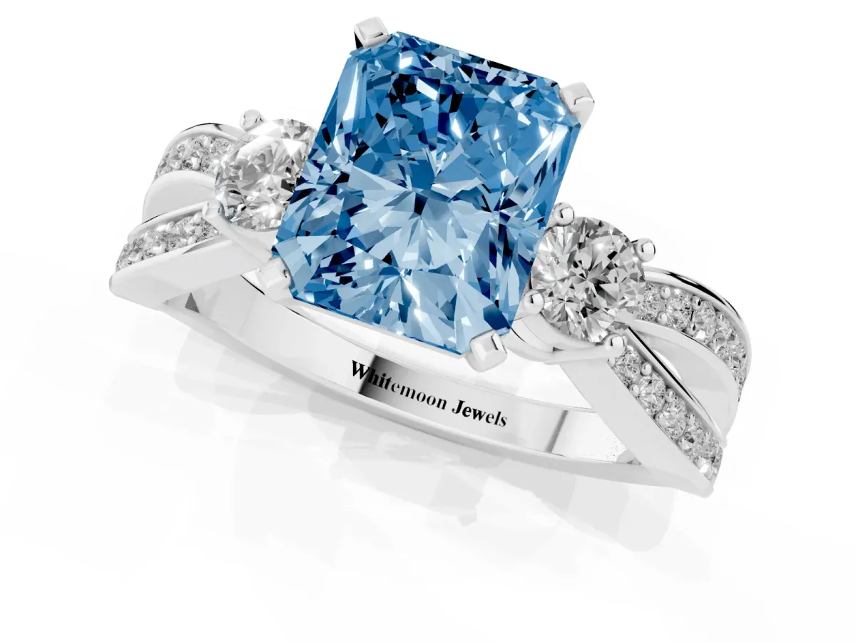Fancy Blue Three-Stone Radiant Cut Cut Diamond Twist Band with Prong Setting Platinum