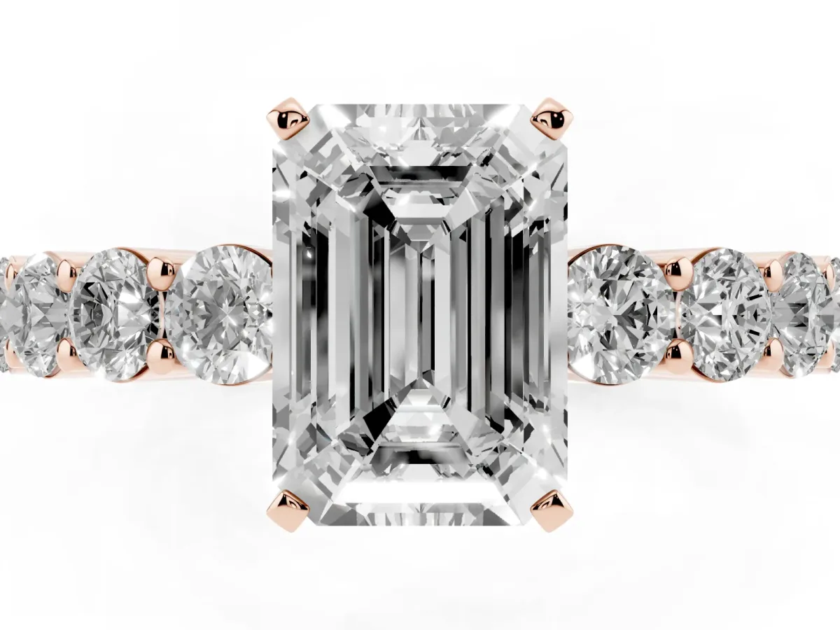 Emerald Cut Diamond Solitaire Ring with Shared Prong Round Side Stones Rose gold