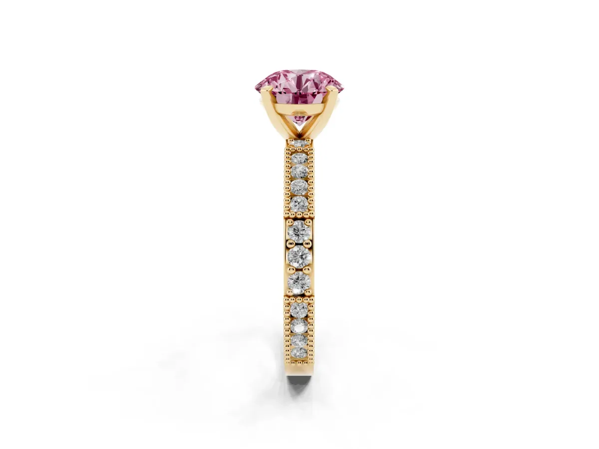 Fancy Pink Round Cut Solitaire with Pavé Band and Four-Prong Setting Yellow gold