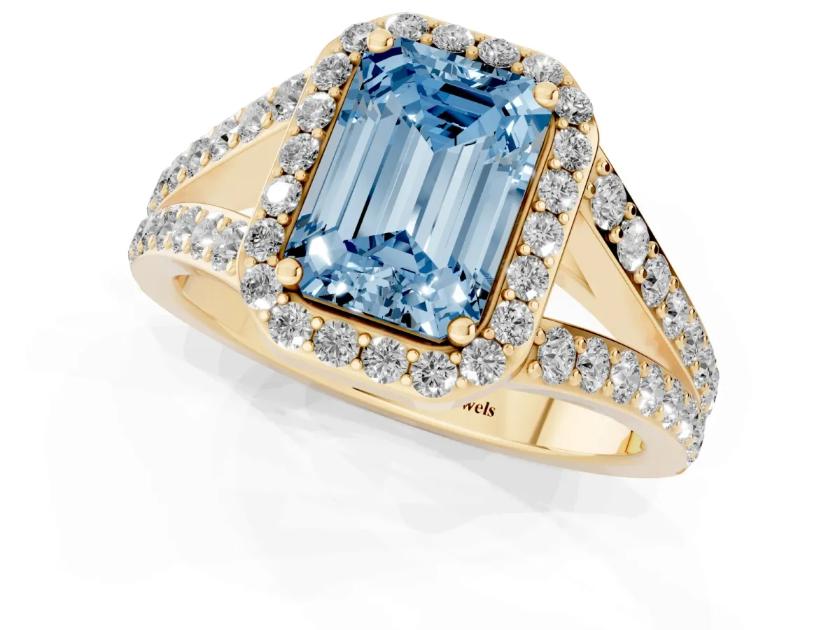 Fancy Blue Emerald Cut Diamond Split Shank Halo Ring with Four-Prong Setting Yellow gold