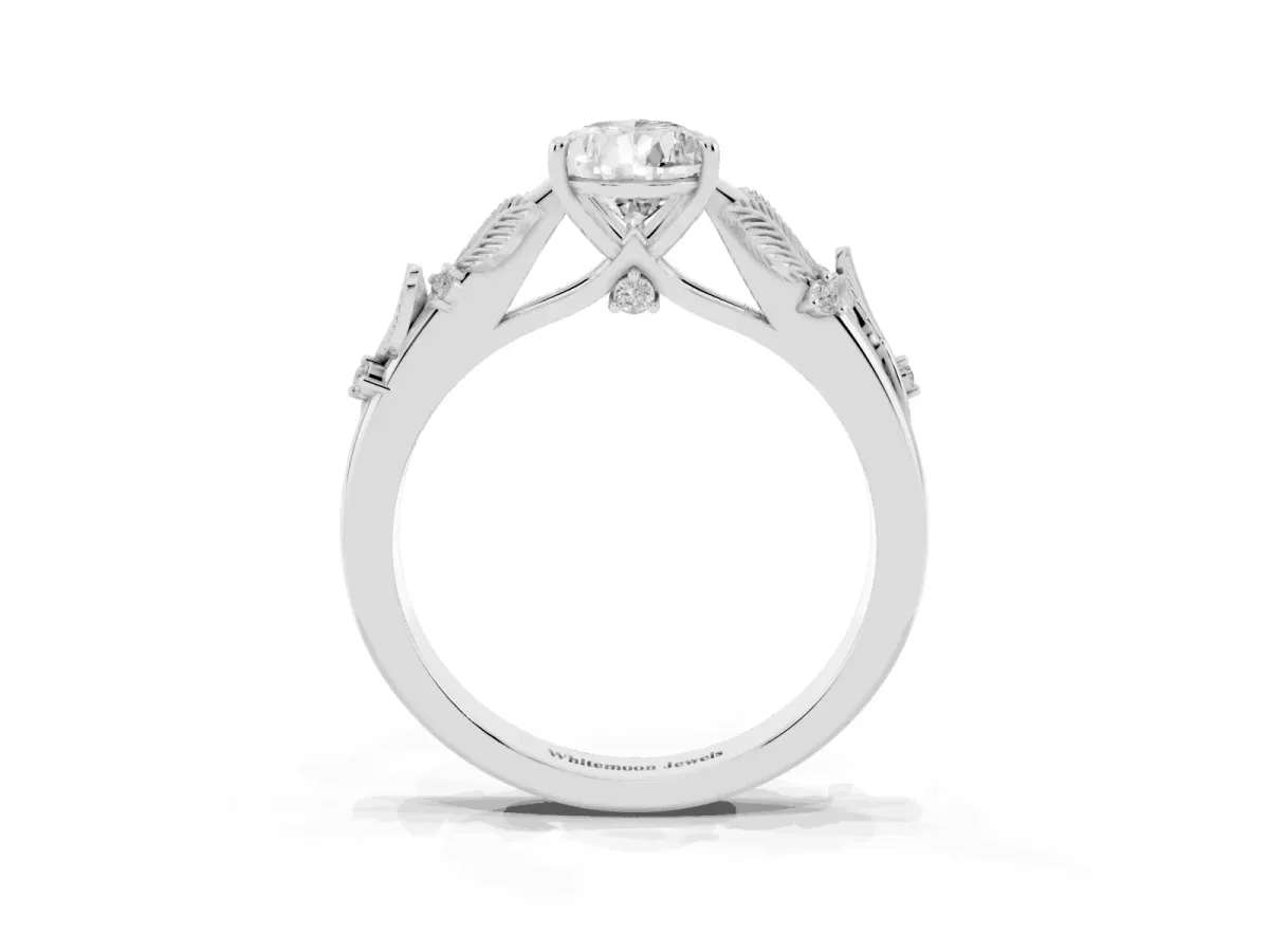 Pear Cut Diamond Solitaire Ring with Leaf Motif Band and Four-Prong Setting Silver