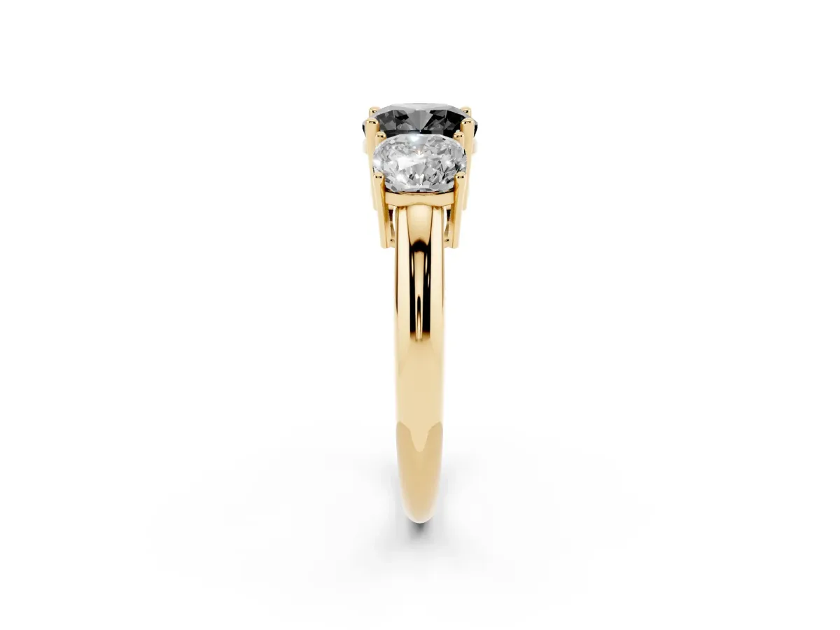 Fancy Black Three-Stone Cushion Cut Cut Diamond Engagement Ring with Prong Setting on a White Gold Band Yellow gold