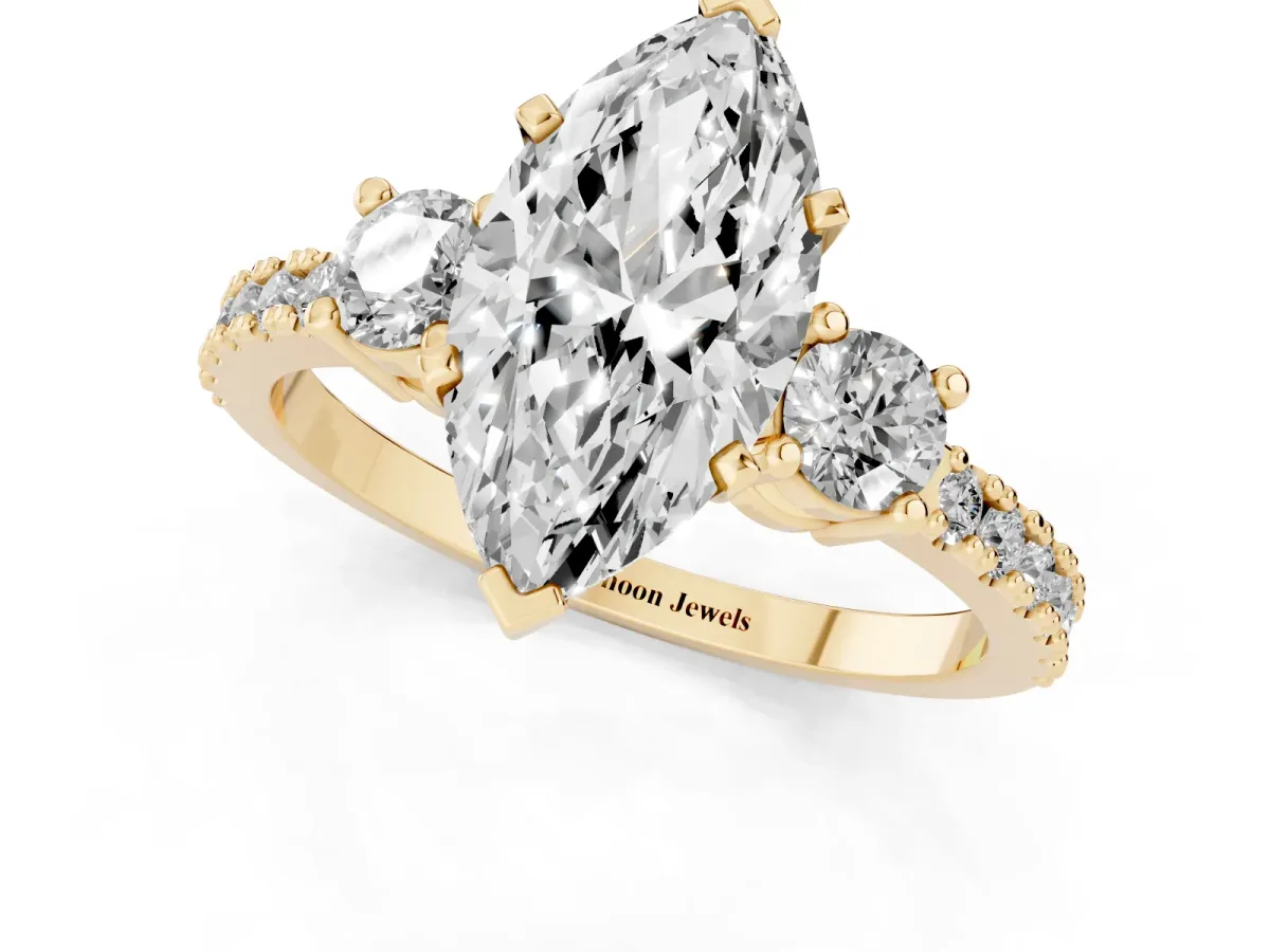 Marquise Cut Three-Stone Diamond Pavé Band with Prong Setting Yellow gold